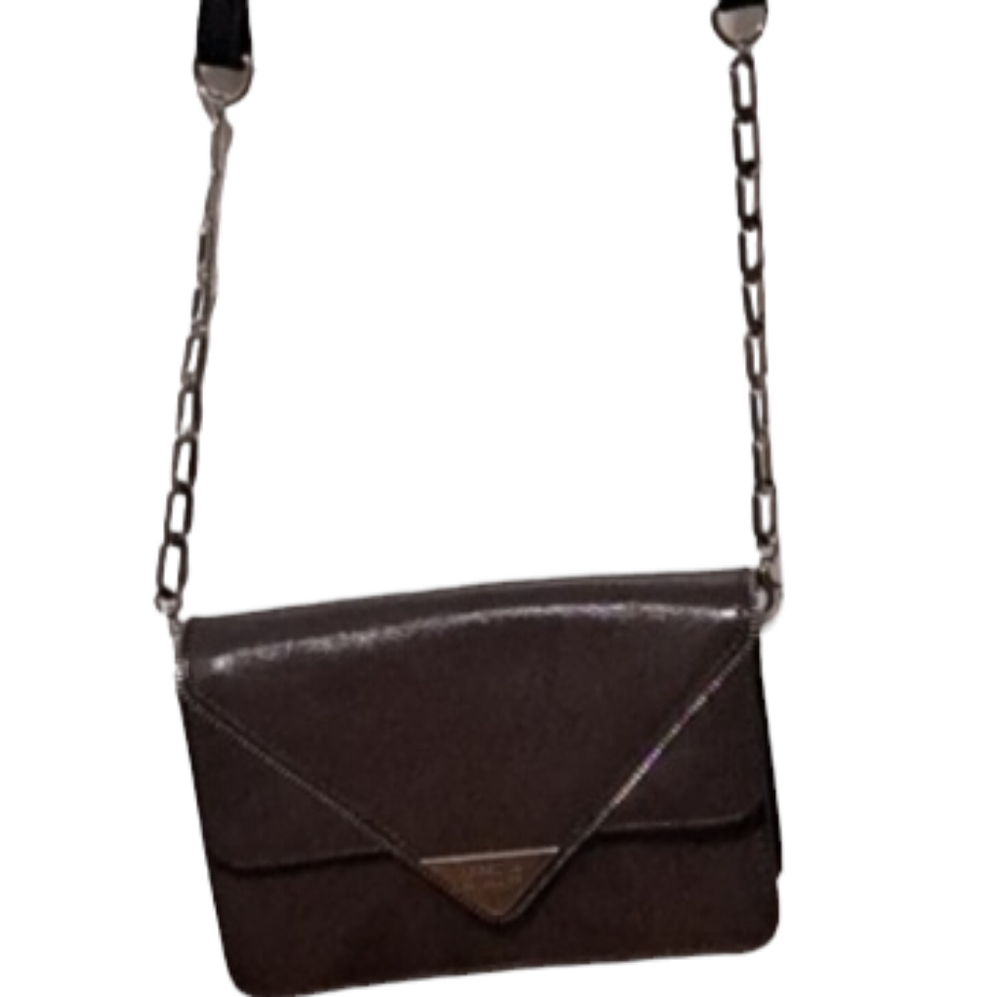 Rebecca Minkoff clutch /crossbody bag. The bag measures 6x8.